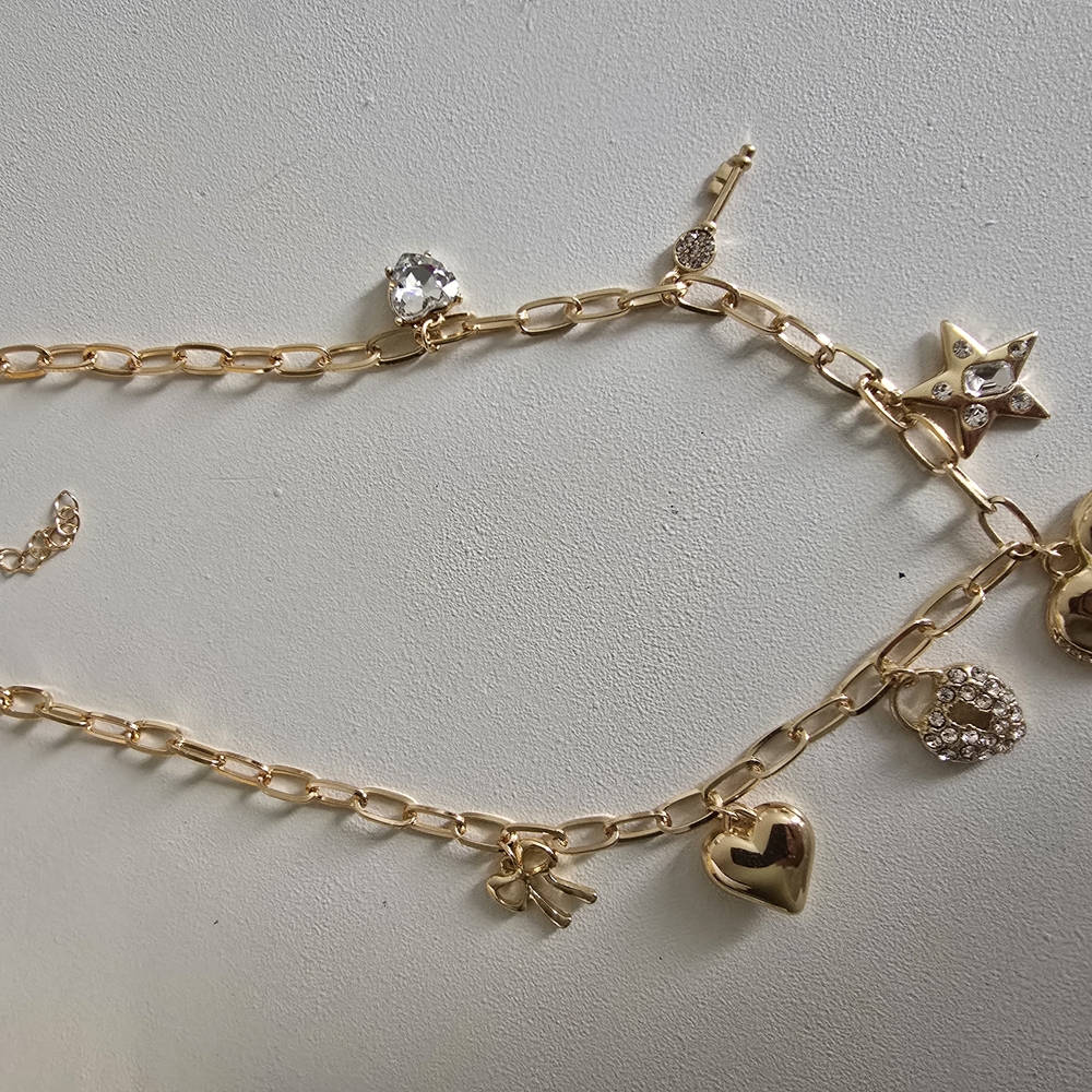 Gold Charm Necklace with Delicate Accents